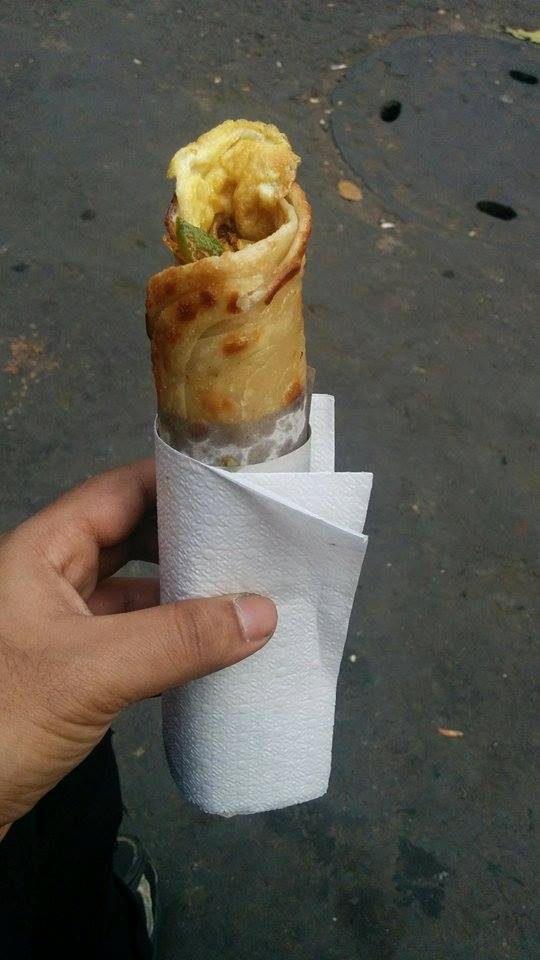 Chicken kathi roll wrapped in paper