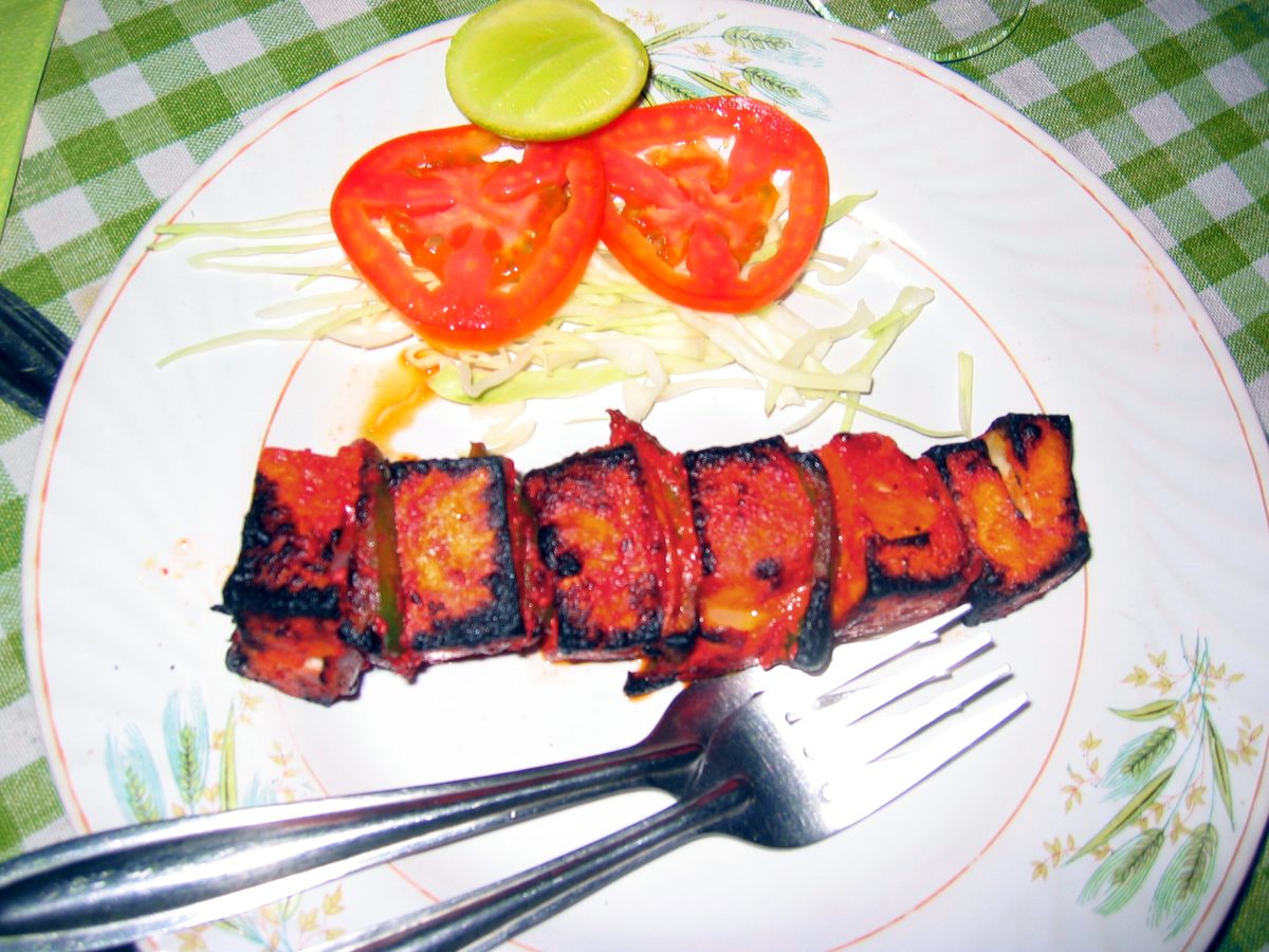 Paneer tikka skewer with grilled vegetables